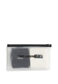 Przezroczysta saszetka na zamek zawierająca czarno-białe przedmioty, z napisem "KARL LAGERFELD" wydrukowanym pogrubioną czcionką w kolorze czarnym. Gładki plastikowy materiał.