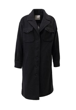 Manteau en laine noir avec un col structuré, fermeture à boutons et deux poches avant. Présente un tissu texturé et une coupe légèrement oversize.