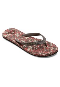 Ruske flip-flop sandale s uzorkom crvene i krem boje na đonu, gumene trake i teksturirani potplat. Ima detalj s logotipom na traci.