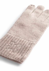 Lichtroze gebreide handschoen met ribbelmanchet, voorzien van een geborduurd bloemenmotief bij de pols. Zachte textuur, ontwerp met vijf vingers.