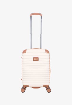 Cremefarbener Hartschalenkoffer mit gerippter Struktur, braunen Akzenten, ausziehbarem Griff und vier Rädern für einfache Mobilität. Das Markenlogo ist auffällig platziert.