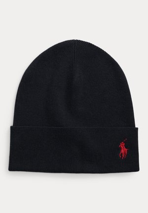 Bonnet en maille noir avec bord replié, orné d'un petit logo rouge brodé représentant un joueur de polo sur le revers.