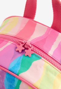 Colorful backpack with a pink, wavy pattern, featuring a zipper with star-shaped pulls and textured fabric handles for grip.