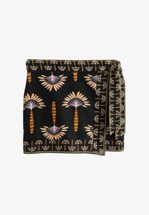 Must rõivas seelik roosaks ja pruuniks lehvikukujuliseks lillemustriks ning dekoratiivse niidist tikandiga ääred, mis on külje peal seotud.