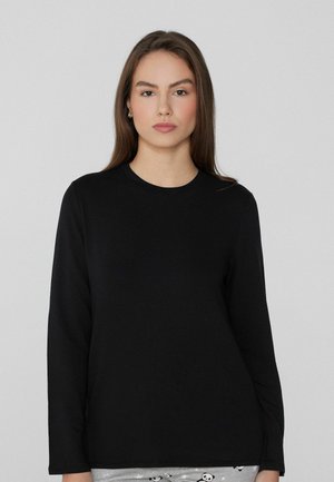 Czarny t-shirt z długim rękawem wykonany z miękkiego materiału, z okrągłym dekoltem i luźnym krojem. Brak widocznych wzorów lub akcentów.