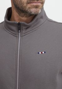 FQ1924 Felpa con zip - grey