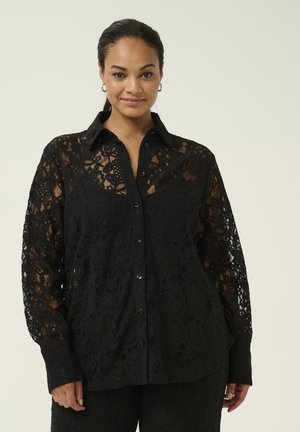 Black lace button-up shirt with long sleeves, floral pattern, and a collar; semi-transparent fabric with a textured finish.
