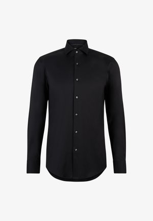 Musthave mustakirju pikkade varrukatega särk, valmistatud siledast kangast, millel on terav krae ja ees nööbid, kumer hem ja ilma mustrite või aktsentideta.