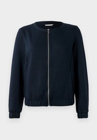 Dunkelblaues Zip-Jacke mit strukturiertem Muster, rundem Halsausschnitt und elastischen Bündchen. Aus gewebtem Material mit enganliegender Passform gefertigt.