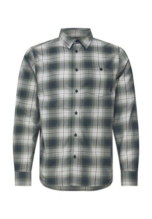 Chemise à manches longues à carreaux dans des tons de vert et blanc, en coton. Présente un col classique et une fermeture boutonnée avec des boutons noirs.