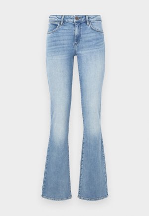 Svetlo modre razširjene kavbojke iz denima. Imajo tradicionalen dizajn s petimi žepi ter zadrgo in gumbom za zapiranje. Bled učinek na stegnih.