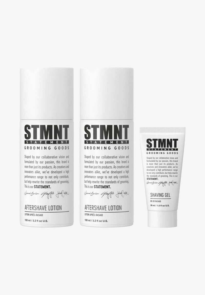 STMTN grooming goods set includes two white cylindrical aftershave lotion bottles and a small white tube of shaving gel, all labeled.