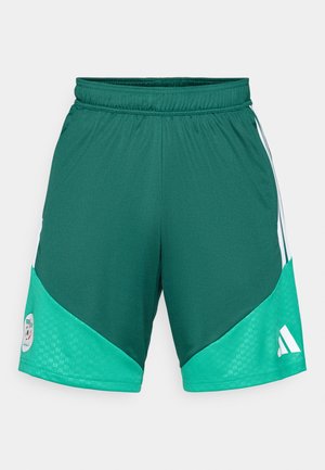 Zelene atletske šorceve sa širokim elastičnim pojasom, kontrastnim tirkiznim detaljima i tri bele pruge, sa logotipom na donjoj levoj strani.