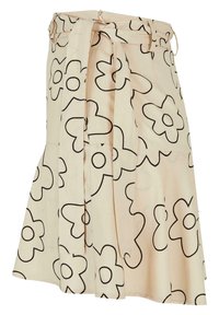Jupe beige avec motif floral noir, fabriquée dans un tissu doux. Elle présente une taille haute, une ceinture à nouer et un design plissé.