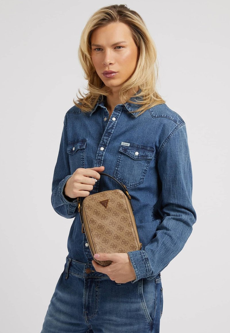 Guess VEZZOLA SLIM UNISEX Across body bag beige Zalando.ie