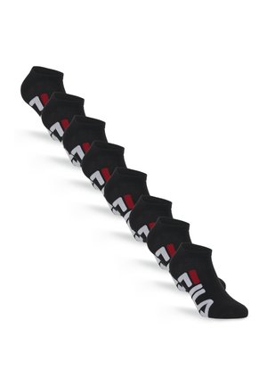Sept paires de chaussettes noires basses avec un texte en gras blanc et rouge sur le côté, disposées en diagonale sur un fond blanc.