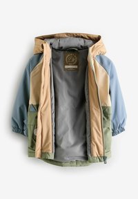Veste colorée avec des panneaux beiges, bleus et verts. Elle possède une capuche, une fermeture éclair et des poignets élastiques. Doublure en tissu lisse et léger.