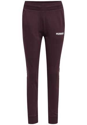 Dark maroon slim-fit joggers with elastic waistband, side pockets, ribbed ankle cuffs, and white "HUMMEL" logo on the right thigh.