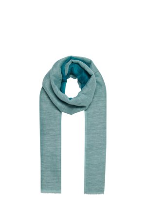 Écharpe légère et texturée dans un dégradé de teal. Se distingue par un matériau doux qui tombe bien, avec des bords effilochés et une doublure intérieure lisse.