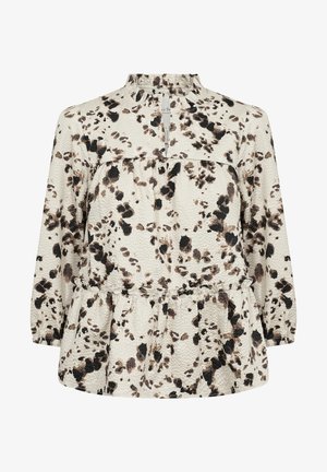 Bluzka z długim rękawem w kolorze kremowym z czarnymi i brązowymi abstrakcyjnymi plamkami. Posiada falbaniasty dekolt i ściągany dół, co zapewnia luźny fason.