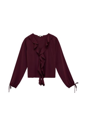 Blouse à manches longues violet foncé avec encolure en V volantée et détails à nouer aux poignets, en tissu léger.