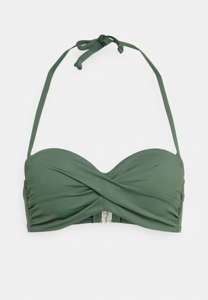 Green bikini top with a padded, bandeau design. It features a twisted front, adjustable tie straps, and a clasp closure at the back.