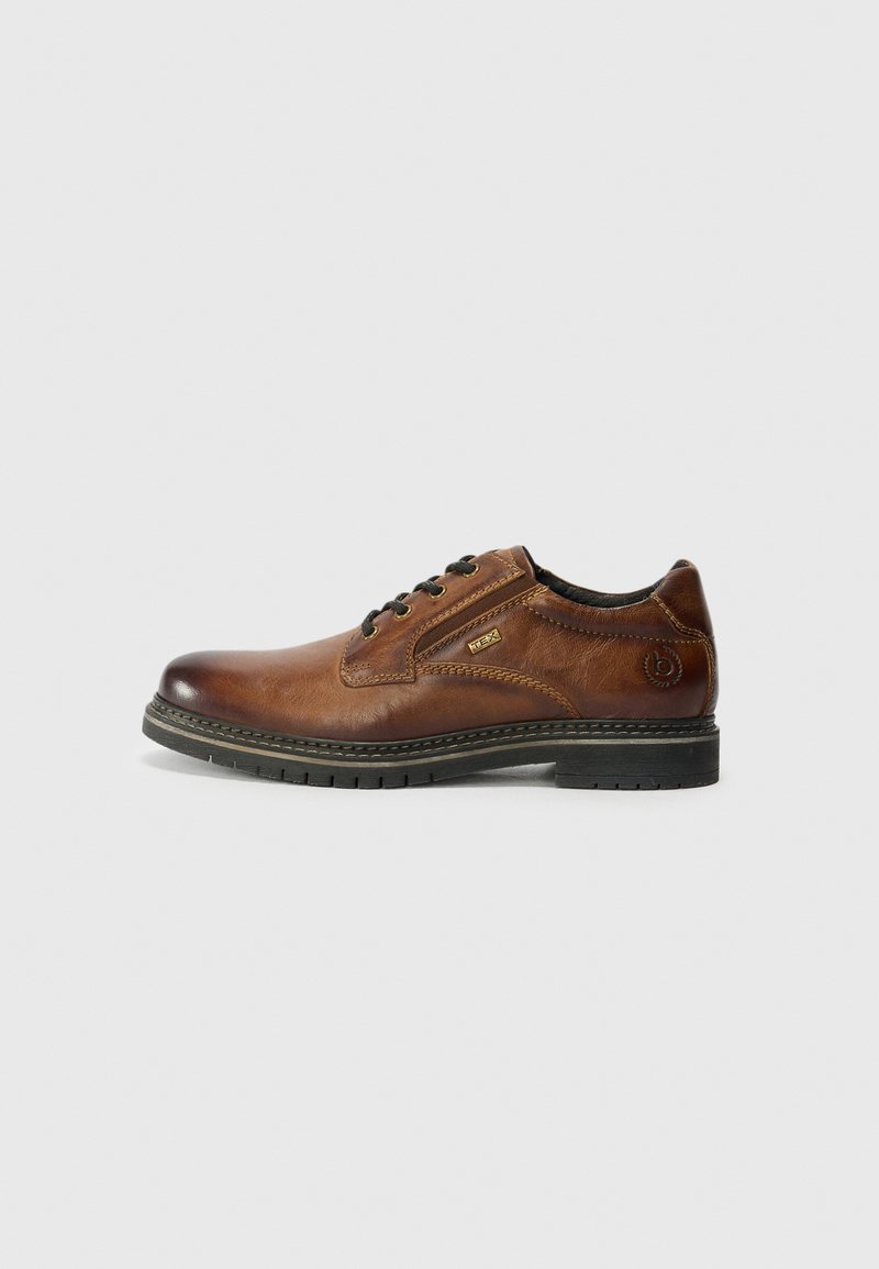 Brown leather dress shoe with a smooth finish, round toe, lace-up design, contrast stitching, and a textured black rubber sole.