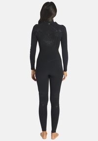 Black wetsuit featuring a back zipper, long sleeves, and reinforced seams, made of flexible material with a smooth texture and subtle branding.