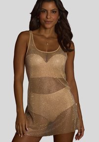 Sheer gold mesh dress with a scoop neckline and fitted style, featuring a netted texture and skin-toned undergarment below.
