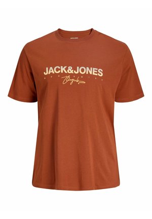 Lyhythihainen oranssi t-paita, joka on valmistettu puuvillasta. Paidassa on iso valkoinen logo, jossa lukee "JACK & JONES" rinnassa, ja sen alla on allekirjoitusyksityiskohta.