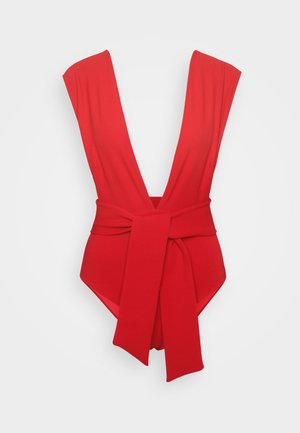 Red one-piece swimsuit with a deep V-neck, wide shoulder straps, and a tied waist belt detail, crafted from stretchy fabric.