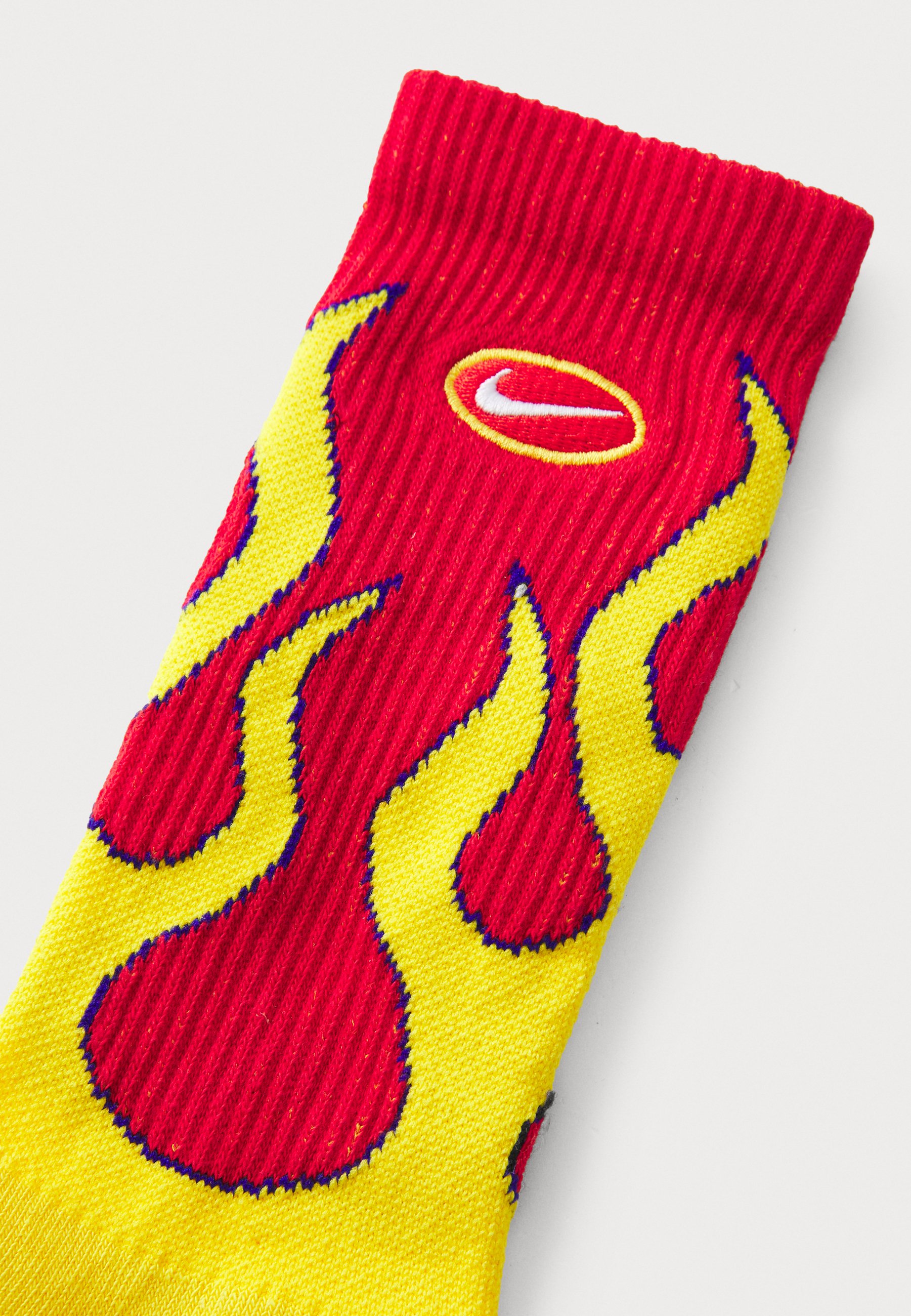 red and yellow nike socks