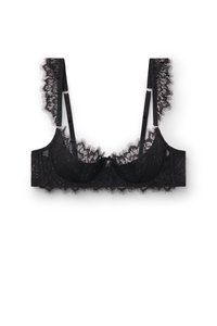 Soutien-gorge en dentelle noire avec armatures, bordure en dentelle festonnée, bretelles ajustables et motif floral sur les bonnets.