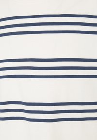 White fabric with horizontal navy stripes of varying width, smooth texture, and a classic t-shirt design. No visible logos or graphics.