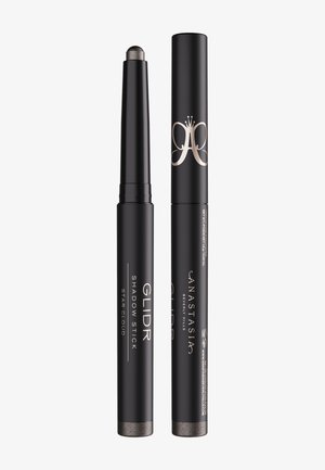 Stick fard à paupières Anastasia Beverly Hills Glidr en teinte Star Cloud, un ouvert montrant l'embout de fard à paupières gris, un fermé avec le logo visible.