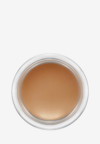 Ronde container met transparante zijkanten en zilveren ribbelaccenten, gevuld met een gladde, metallic bronzen crème.