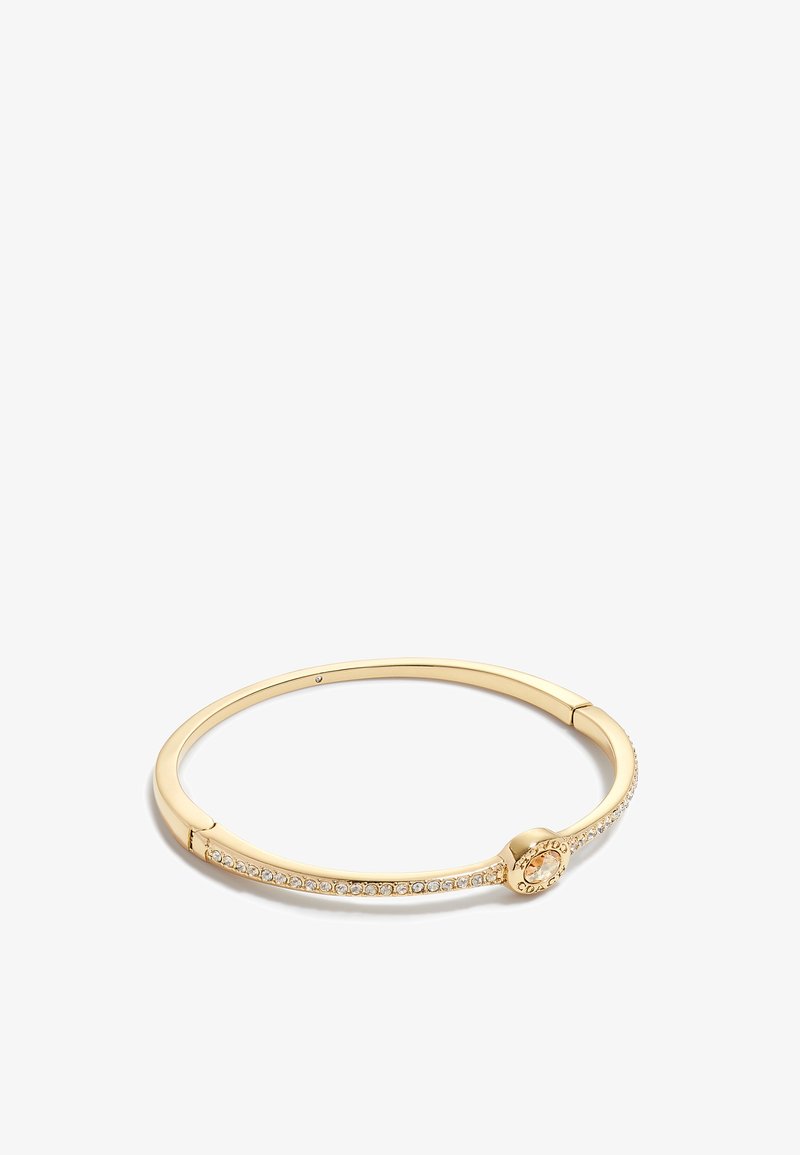 Gold-tone bangle bracelet with clear crystals along the band and a central round crystal accent.