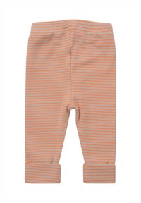 Baumwollleggings in hellbeige mit feinen orangenen Streifen. Sie verfügen über einen bequemen Bund und umgeschlagene Säume an den Knöcheln.