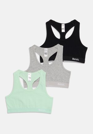 Drei zerschnittene Sport-BHs in Mintgrün, Grau und Schwarz. Jeder verfügt über ein Racerback-Design, weiches Baumwollmaterial und einen kontrastierenden Logo-Bund.