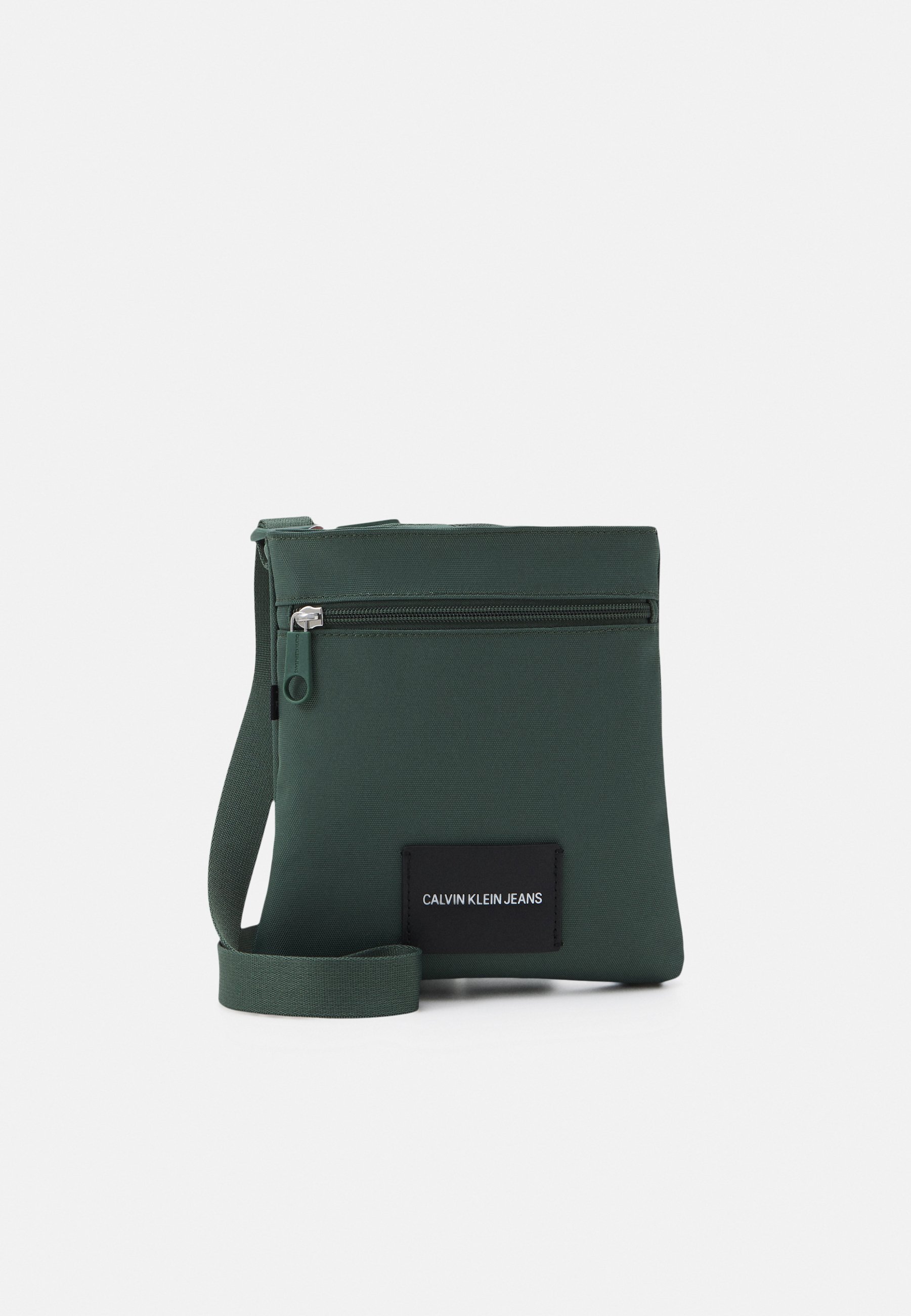 Calvin Klein Jeans MICRO FLATPACK UNISEX - Borsa a tracolla - green/verde -  Zalando.it