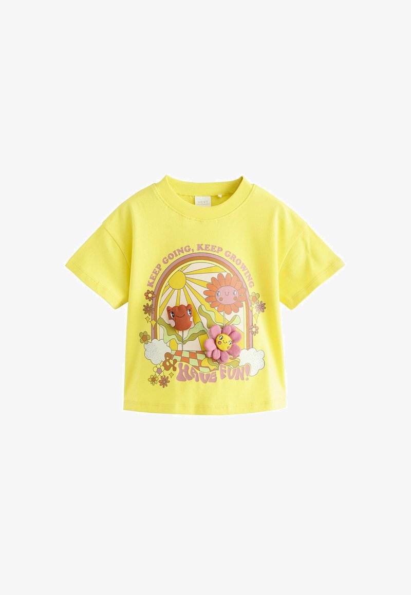 Yellow short-sleeve t-shirt with colorful sun and flowers design, including cartoon faces and the words "Keep Going, Keep Growing, Have Fun."