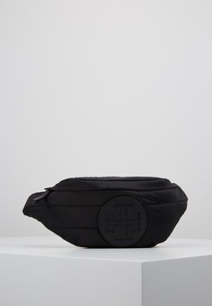 Black quilted waist bag with zipper and embossed circular logo on front, placed on white pedestal against gray background.