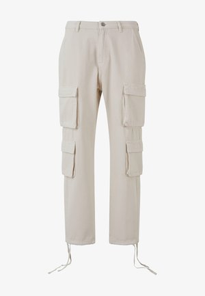 Pantalones cargo beige de algodón, con cuatro bolsillos grandes, un diseño de piernas rectas y lazos ajustables en los tobillos.