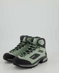 Lichtgroene wandelschoenen met zwarte accenten, met een gestructureerde bovenkant, rubberen zool, versterkte neus en een multidirectioneel vetersysteem.