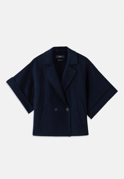 Veste en mélange de laine bleu marine avec un col châle, fermeture à double boutonnage, manches courtes et deux poches avant.