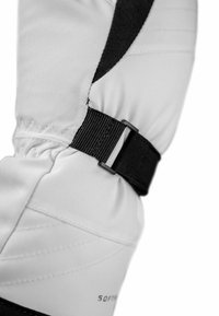 Weißer Isolierhandschuh mit schwarzen Akzenten, der über einen strukturierten Handgelenkbereich, einen verstellbaren Riemen und subtile Nähdetails verfügt.