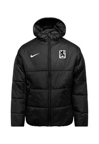 Zwarte pufferjack met capuchon, ritssluiting en elastische manchetten. Voorzien van een wit Nike-logo en een wit teamembleem op de borst.