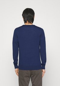 J.LINDEBERG Stickad tröja - blue