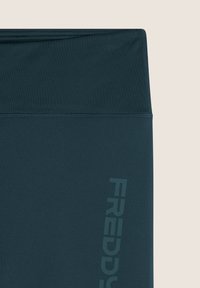 Freddy CORSARO CON LOGO GLITTER - Leggings - dark sea