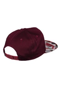 Maroon cap with a patterned brim featuring red and green designs. Adjustable snapback closure at the rear. Soft fabric texture.